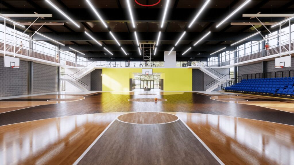 A basketball court with lights on the ceiling.